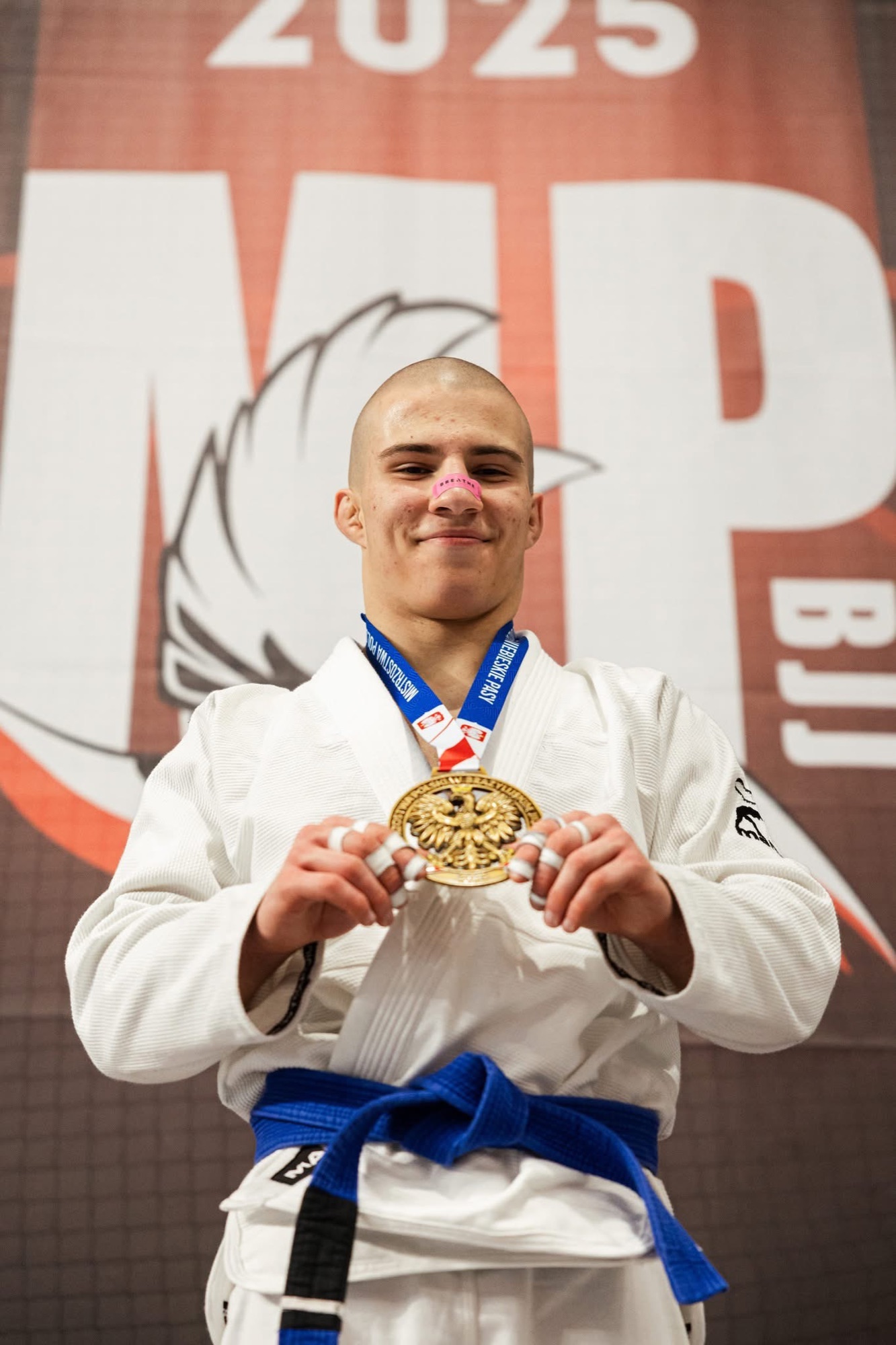 Patryk Prucnal with a gold medal after Polish BJJ Championships